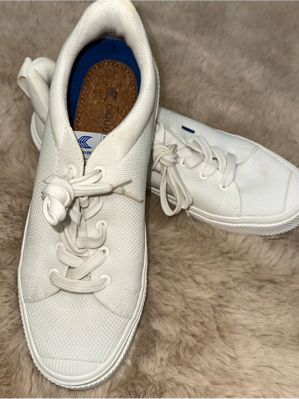 Cariuma White Sneakers with Blue Accents